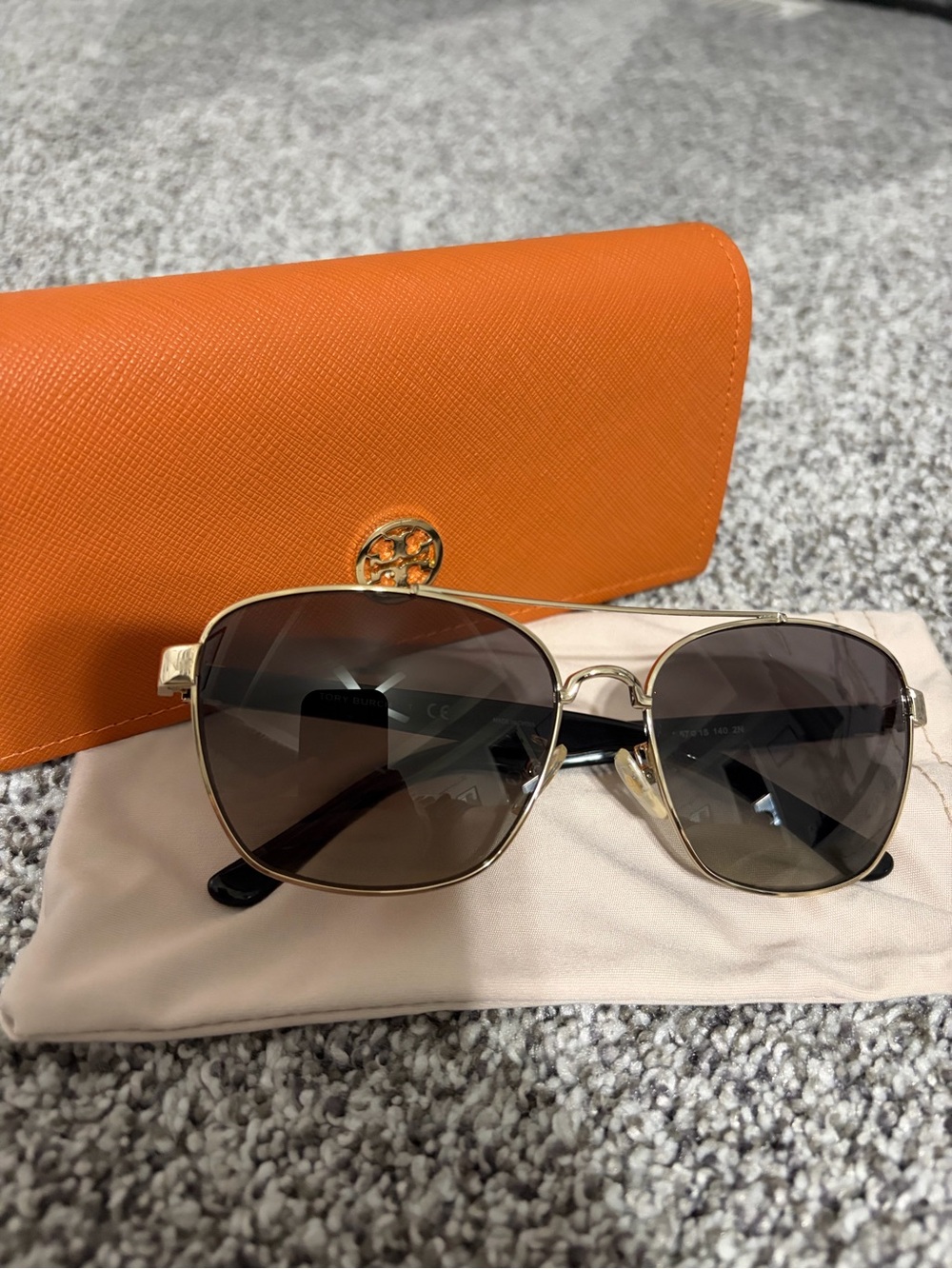 Tory Burch women’s Gold Frame Sunglasses with Brown Lenses